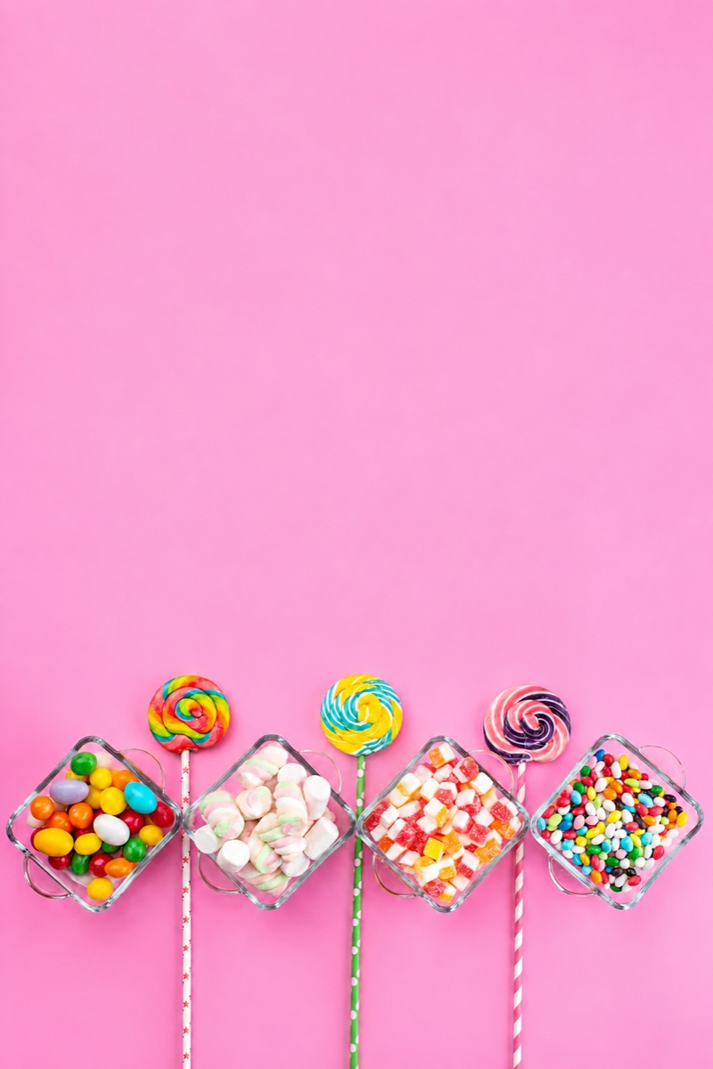 Colorful Swedish pick-and-mix candy, lollipops and sweets on a pink background at Lollipop Swedish Candystore in Orihuela Costa